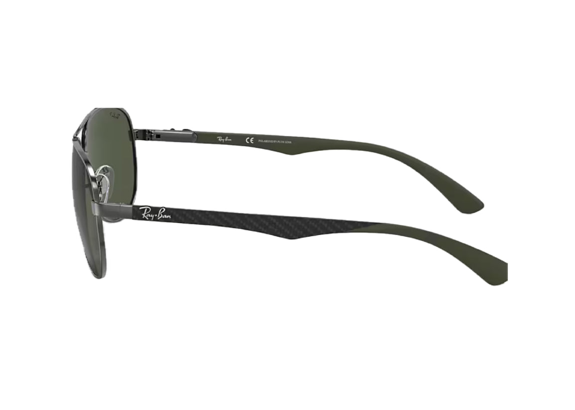 A pair of Rayban RB8313 sunglasses with green lenses and black carbon frames, showing the side profile of the glasses.