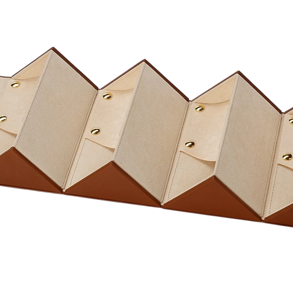 Wooden jewelry display with geometric design on a white background