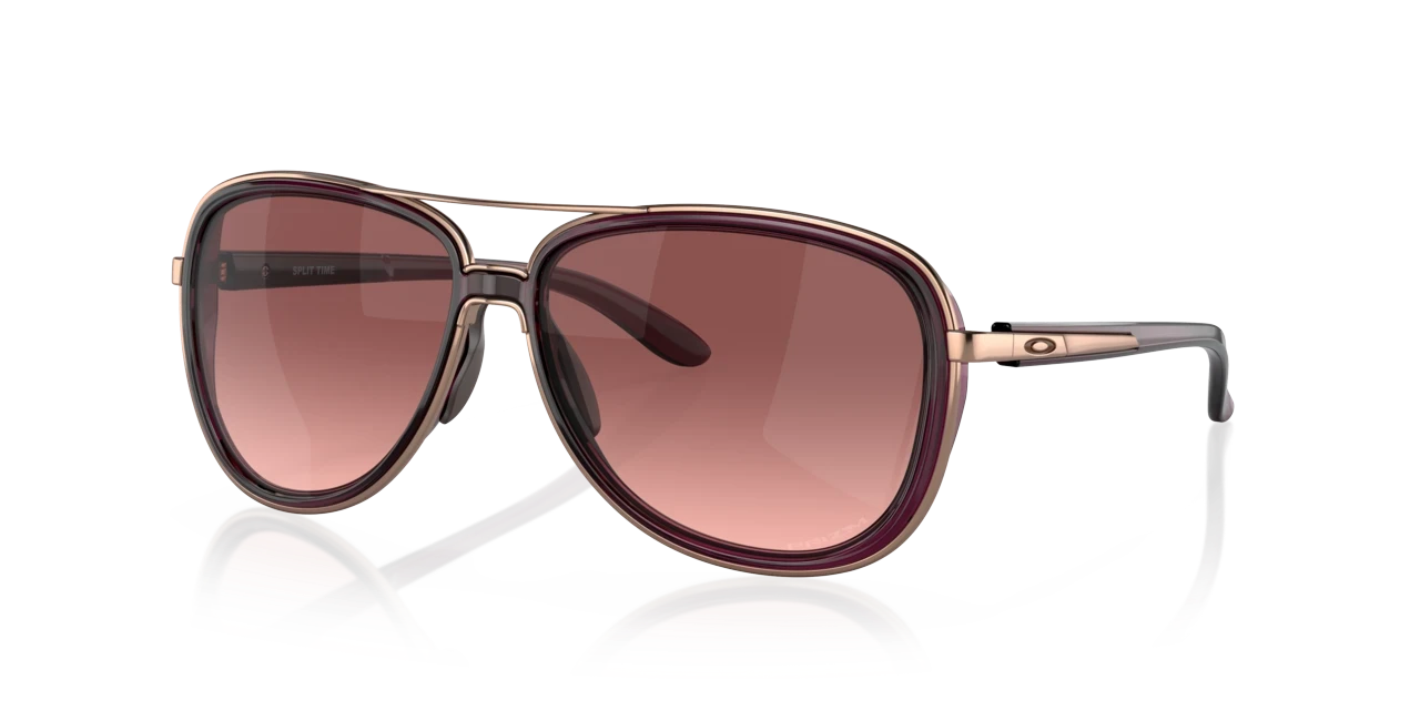Sunglasses UK Oakley Split Time sunglasses with rose-tinted lenses and a metallic frame in a three-quarter view.