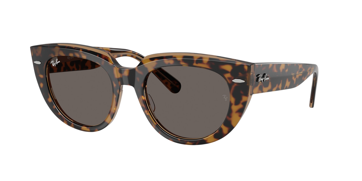 Sunglasses UK Ray-Ban Doreen RB2286 sunglasses in a classic tortoiseshell acetate frame with dark grey lenses.