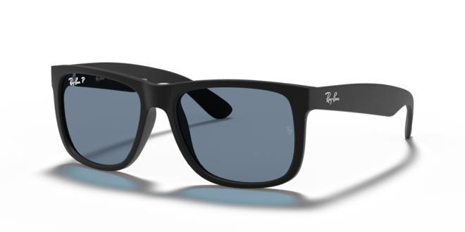 Black sunglasses with a reflective surface on a white background