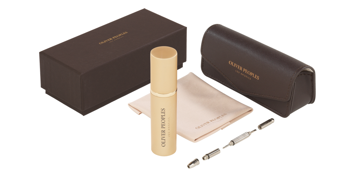Oliver Peoples care kit with lens spray, cloth, screwdriver and leather case