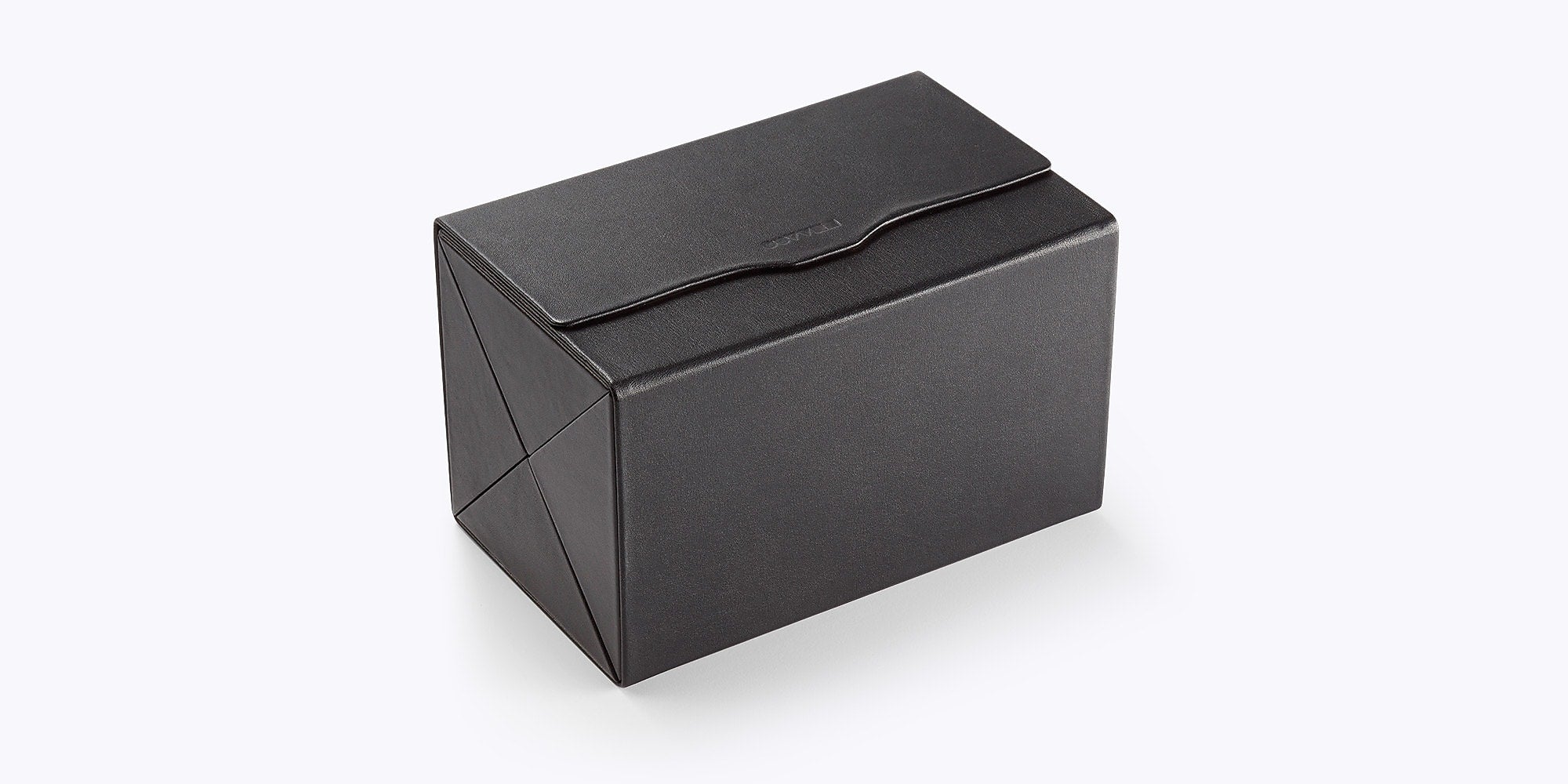 Black rectangular box with a brand logo on a white background