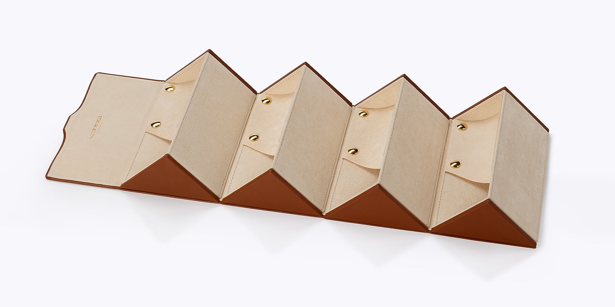Wooden jewelry display with geometric design on a white background