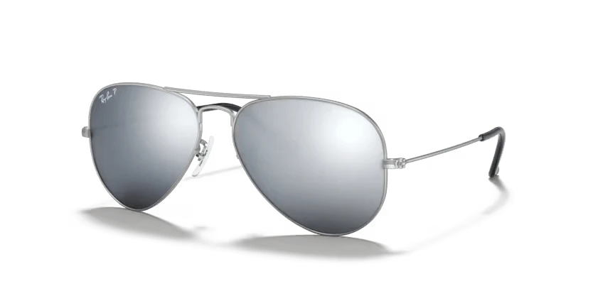 A pair of Ray-Ban sunglasses with green lenses and a gold frame, known for their aviator style.
