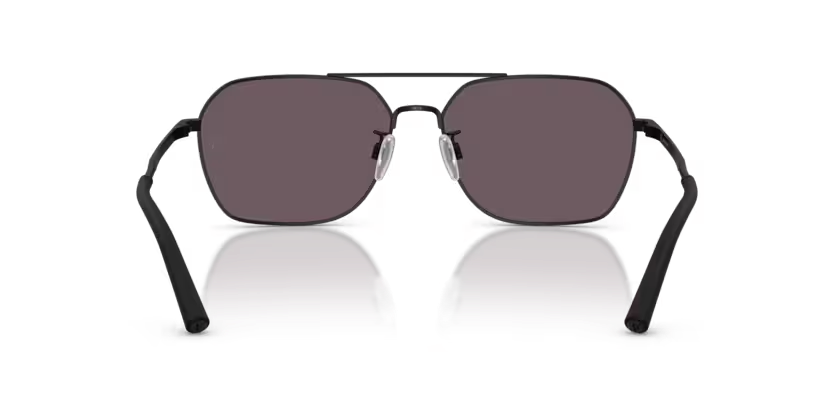 Oliver Peoples sunglasses viewed from behind, showing the replacement nose pads on the bridge