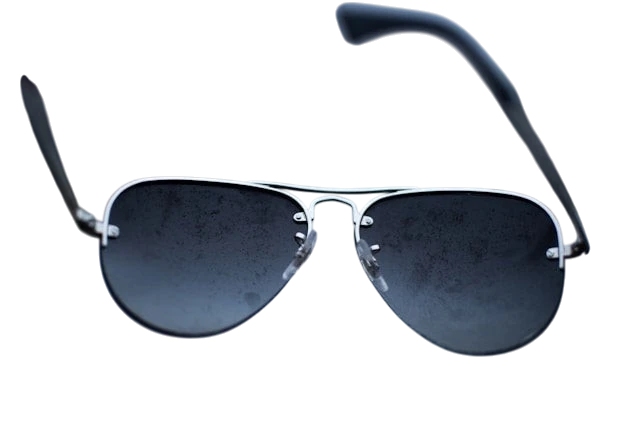 A pair of sunglasses with a silver metal frame, showing signs of tarnish or dirt on the lenses and frame.